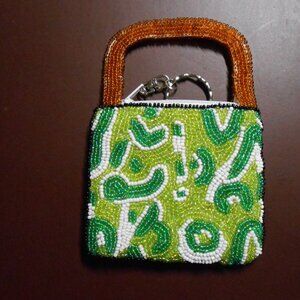 Vintage "Elissa held for Two's Company" beaded bag/change purse.